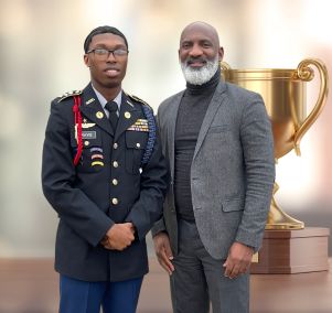  Charles Travis, cadet of the year with superintendent Dr. Greene